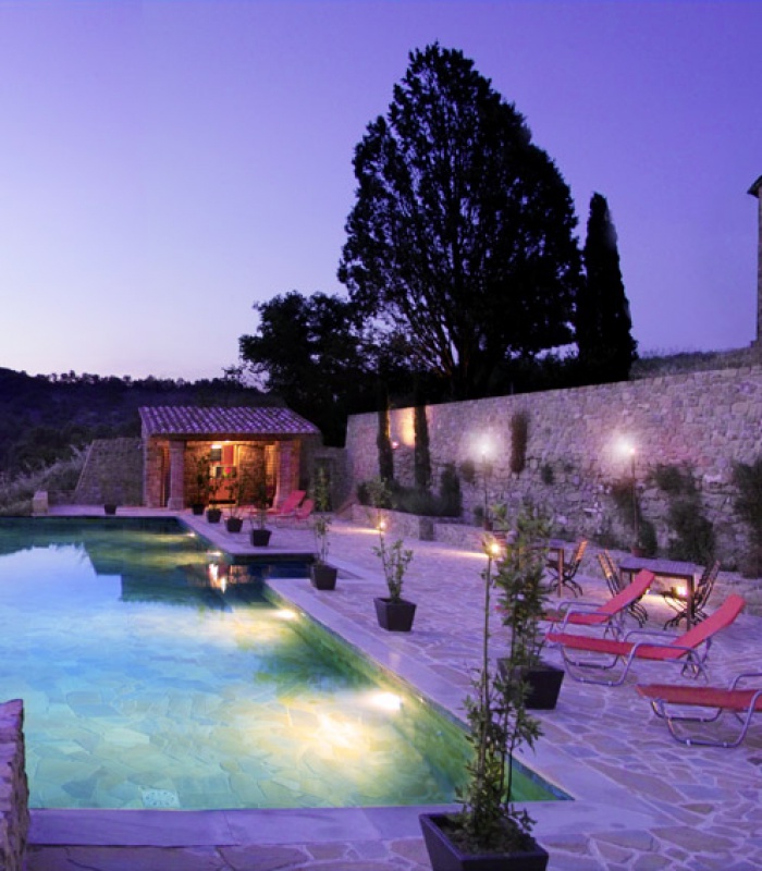 Swimming pool and terrace by night
