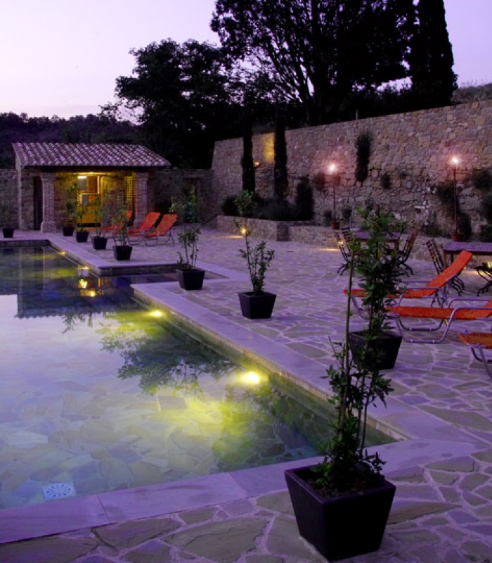 Swimming pool and terrace by night