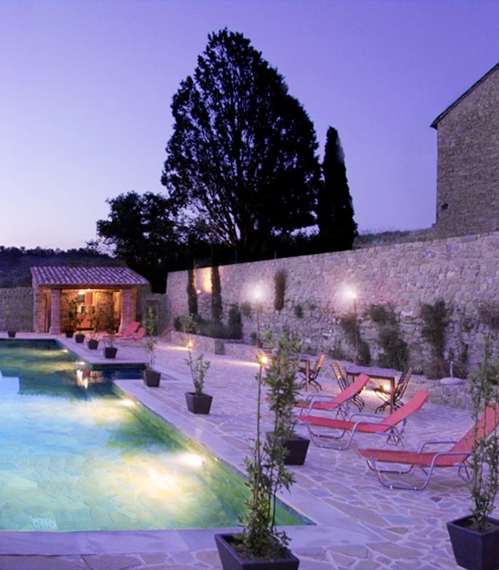 Swimming pool and terrace by night